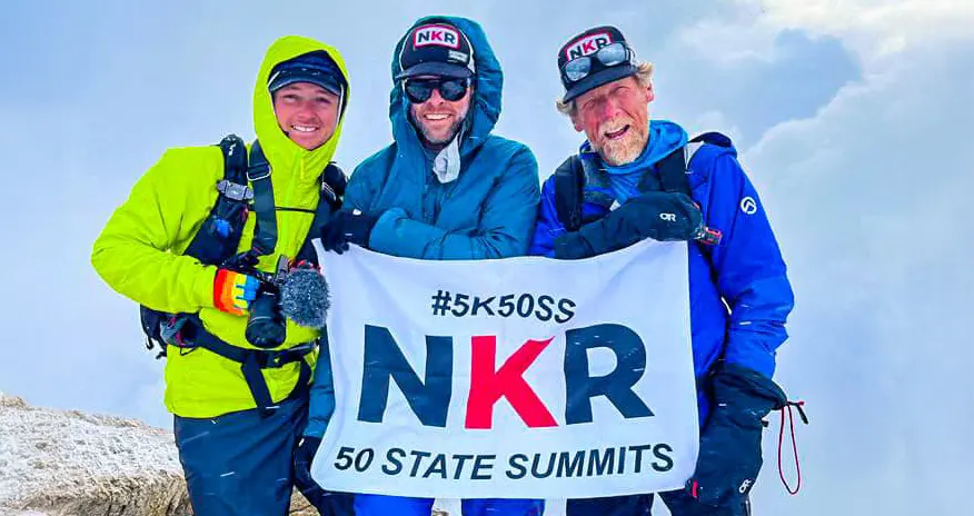 Image of sponsored athlete, David Ashley, at the summit of a mountain